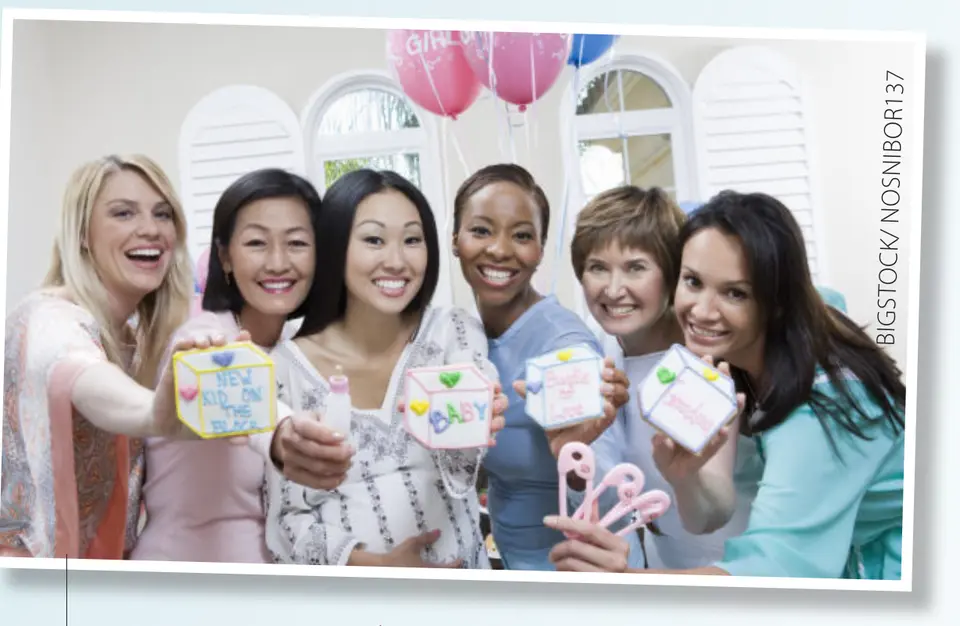 Guests holding baby shower gifts. (BIGSTOCK/NOSNIBOR137)