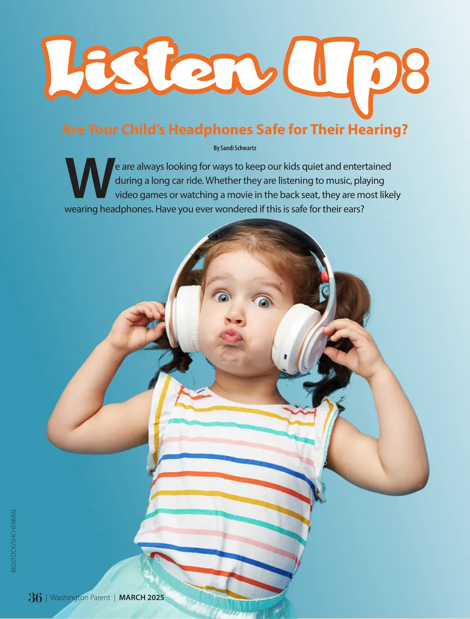 A young girl wearing large white headphones against a blue background. (Bigstock/Shcherban)