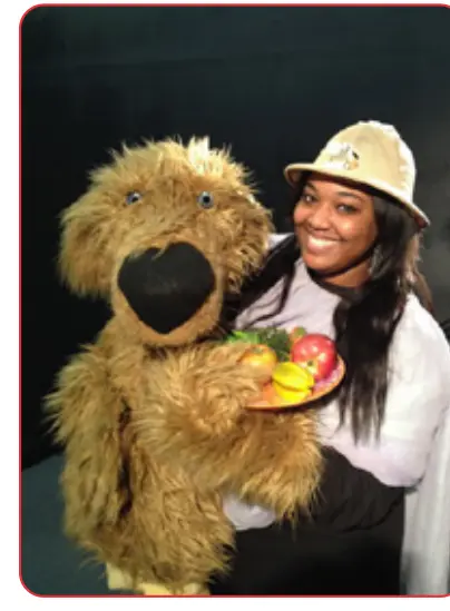 Gus Goes Green: Earth Day Edition features "Gus," a giant dog puppet.