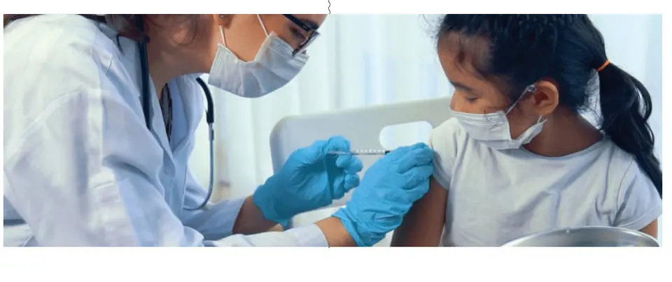 A health care provider administers a vaccine to a young girl. (Bigstock/Freshpixel)