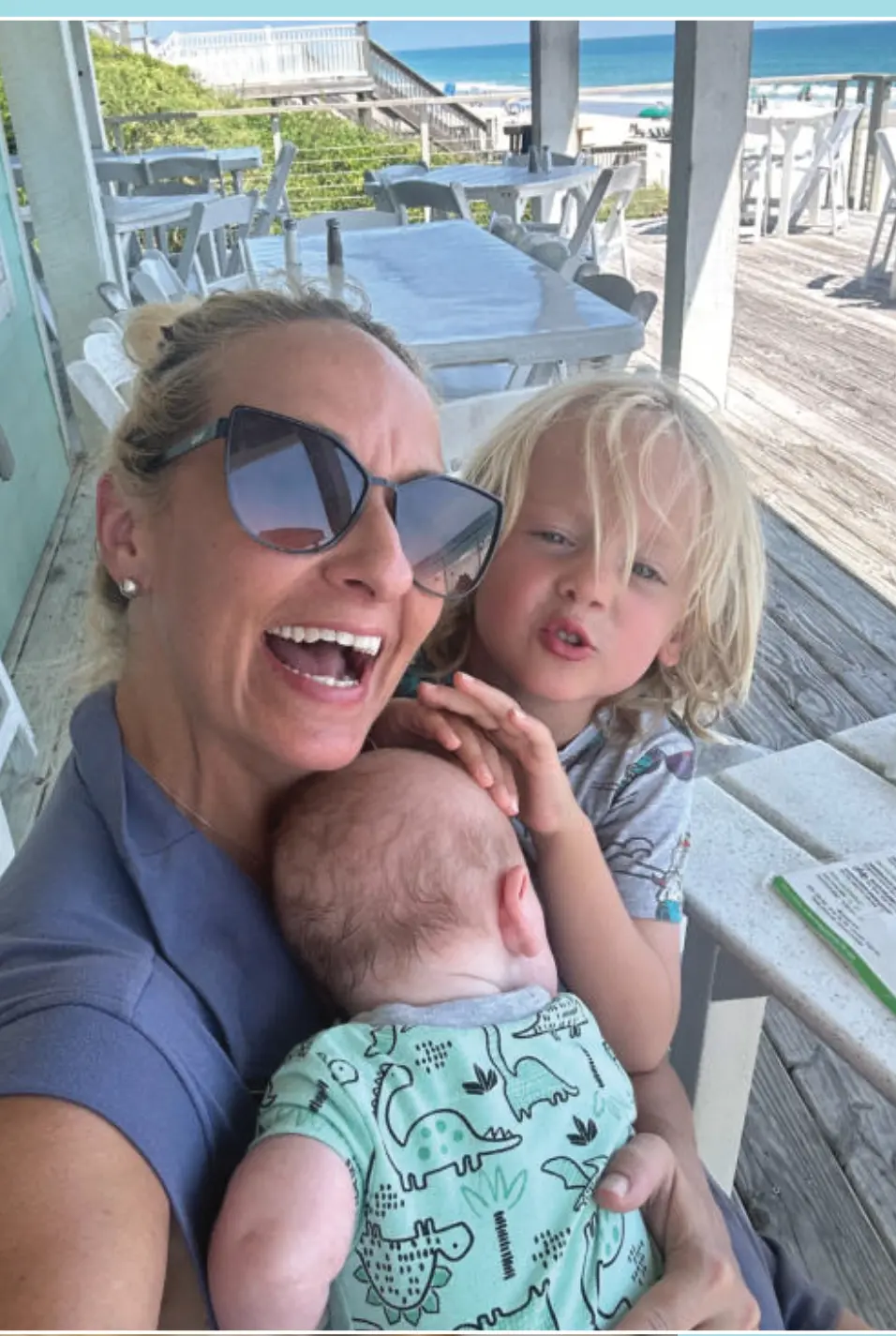 Ricketts with Crew and baby Cole at the beach.